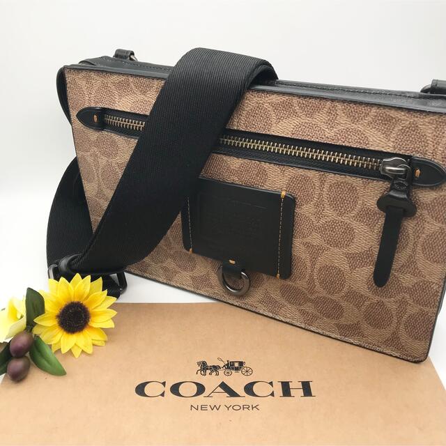 COACH ★大人気★ リビングトン コンバーチブル ポーチ シグネチャー 新品