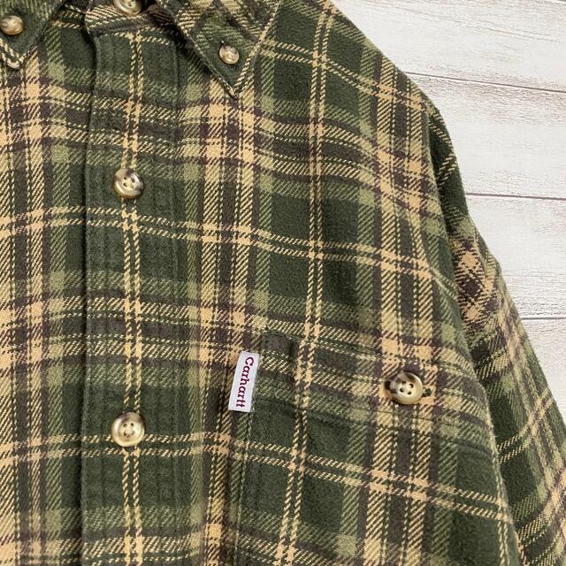 carhartt(カーハート)の【アースカラー】90sカーハートワンポイントラベルロゴチェック総柄ネルシャツ メンズのトップス(シャツ)の商品写真