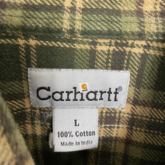 carhartt(カーハート)の【アースカラー】90sカーハートワンポイントラベルロゴチェック総柄ネルシャツ メンズのトップス(シャツ)の商品写真