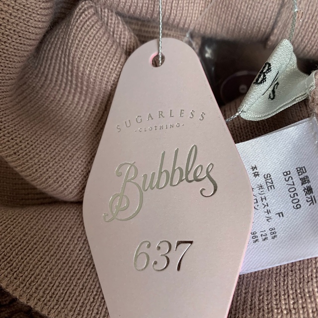 Bubbles(バブルス)のBUBBLES ランタンスリーブショートニット　肩　リボン　タグ付き レディースのトップス(ニット/セーター)の商品写真