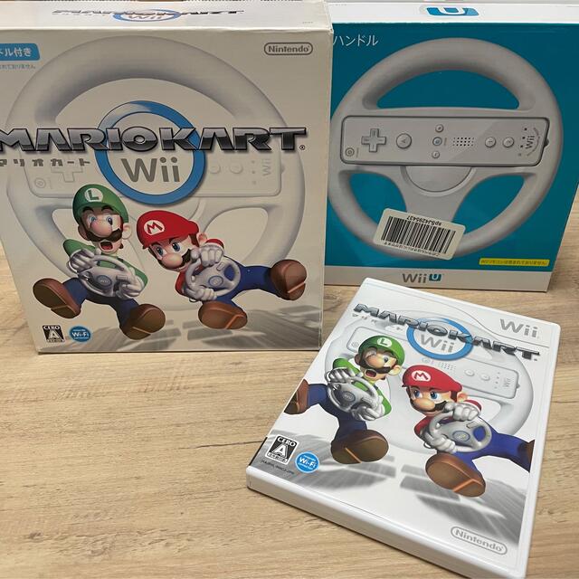 任天堂(ニンテンドウ)のマリオカート Wii ハンドル 2個セット 任天堂 エンタメ/ホビーのゲームソフト/ゲーム機本体(家庭用ゲームソフト)の商品写真