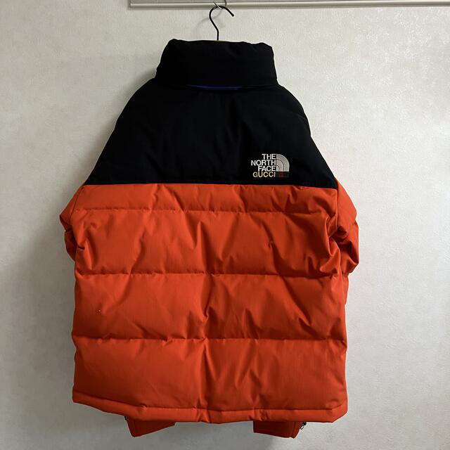 Gucci(グッチ)のTHE NORTH FACE x GUCCI ダウン オレンジ ヌプシ M メンズのジャケット/アウター(ダウンジャケット)の商品写真