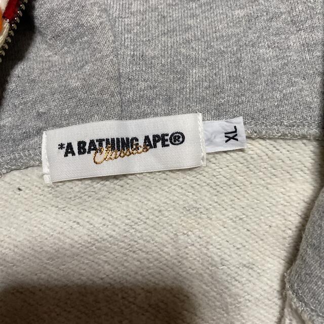 A BATHING APE(アベイシングエイプ)のAPE BAPE KAWS 仙台　TIGER シャークパーカー　XL CAMO メンズのトップス(パーカー)の商品写真