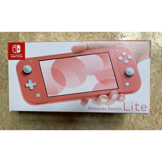 任天堂(ニンテンドウ)のNintendo Switch LITEコーラル　新品・未使用・未開封 エンタメ/ホビーのゲームソフト/ゲーム機本体(携帯用ゲーム機本体)の商品写真