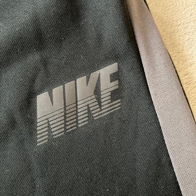 NIKE(ナイキ)のNIKEナイキ黒キッズラインパンツジャージ裏起毛サッカーバスケ男女兼用150 キッズ/ベビー/マタニティのキッズ服男の子用(90cm~)(パンツ/スパッツ)の商品写真