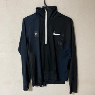 ナイキ(NIKE)のNIKE sacai ハーフジップ　ジャージ　M 8-10(ジャージ)