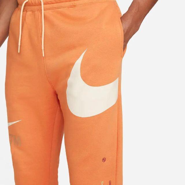 NIKE(ナイキ)の【欧州モデル】Nike Swoosh フリース　ジョガーパンツ　オレンジ 海外S メンズのパンツ(その他)の商品写真