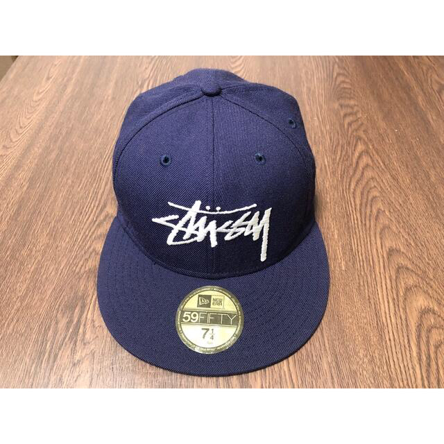 STUSSY(ステューシー)のSTUSSY  ニューエラキャップ　ネイビー メンズの帽子(その他)の商品写真