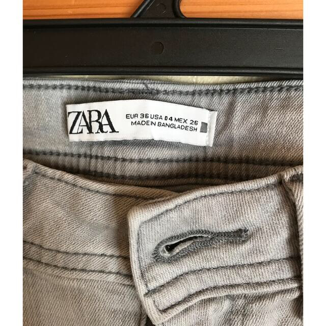 ZARA(ザラ)のZARAミッドライズアシンメトリーヘムスキニーデニム36 レディースのパンツ(デニム/ジーンズ)の商品写真