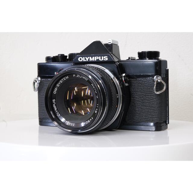 OLYMPUS OLIMPUS OM-1 ブラック ZUIKO f1.8 (整備品)の通販 by フィルムマンハッタン オリンパスならラクマ  【25％OFF】