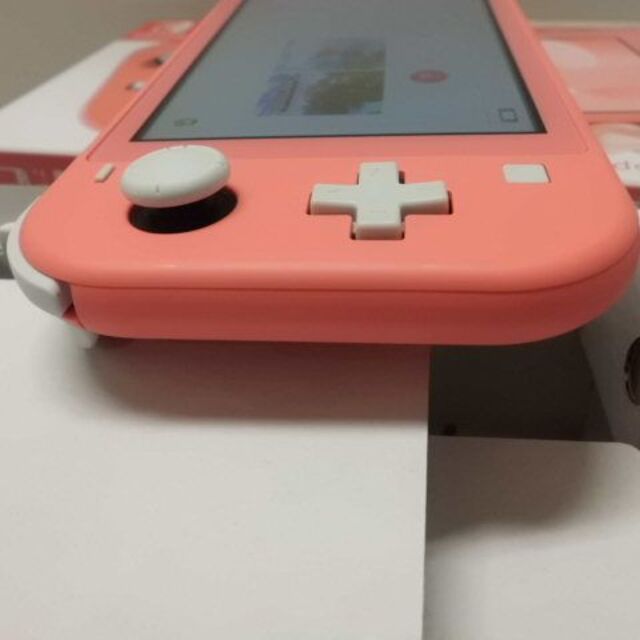 Nintendo Switch(ニンテンドースイッチ)のNintendo Switch Lite Coral エンタメ/ホビーのゲームソフト/ゲーム機本体(携帯用ゲーム機本体)の商品写真