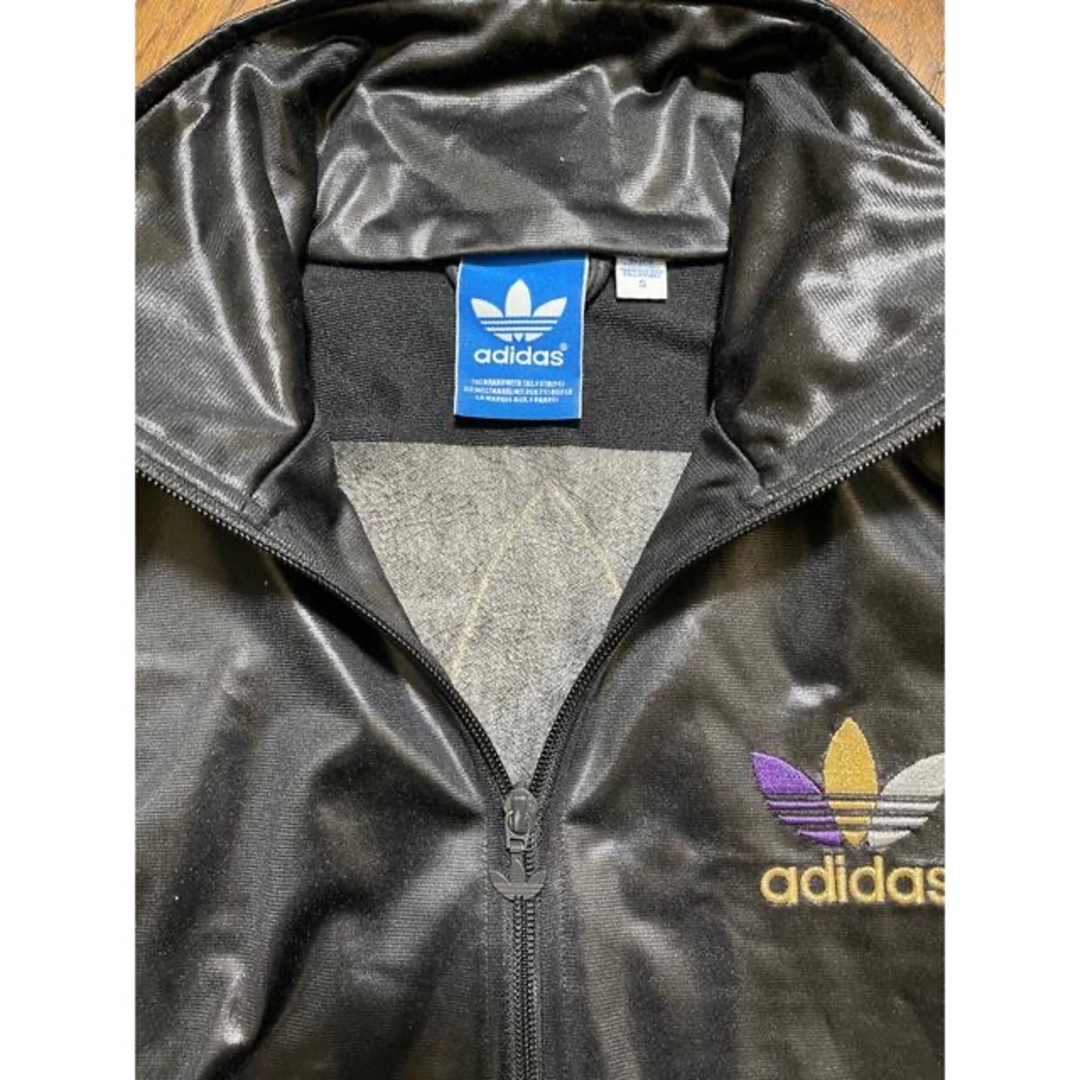 adidas - adidas コーティングジャージ chile62 黒×紫 の通販 by adidas - adidas コーティングジャージ chile62 黒×紫 の通販 by