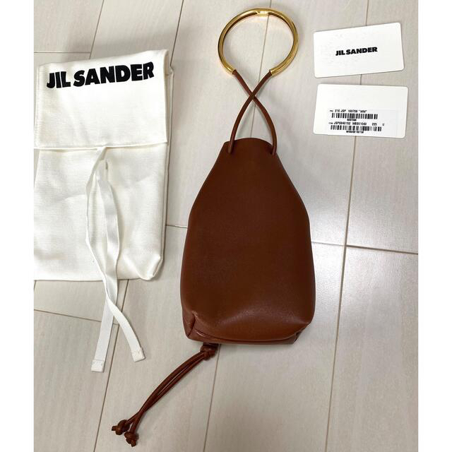 Jil Sander(ジルサンダー)の訳あり　未使用Jil Sanderドローストリングクロージャー /スモールバッグ レディースのバッグ(ハンドバッグ)の商品写真