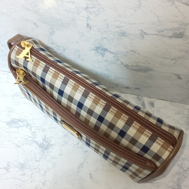 AQUA SCUTUM(アクアスキュータム)の【新品/タグ付】Aquascutum キュータムチェック クラッチバッグ 金具 メンズのバッグ(セカンドバッグ/クラッチバッグ)の商品写真