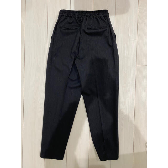 COMOLI(コモリ)のSOUMO slit easy trousers  メンズのパンツ(スラックス)の商品写真