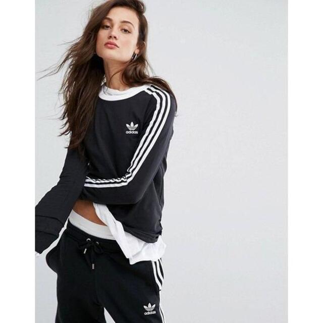 adidas(アディダス)の【新品未使用】アディダスオリジナルス　3ストライプ 長袖Tシャツ　黒　M レディースのトップス(Tシャツ(長袖/七分))の商品写真