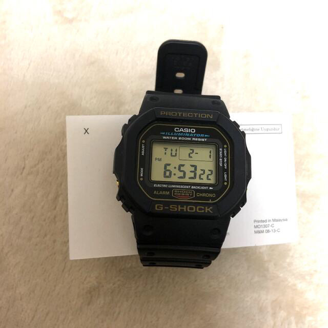 CASIO G-SHOCK DW-5600E  ゴールド メンズの時計(腕時計(デジタル))の商品写真