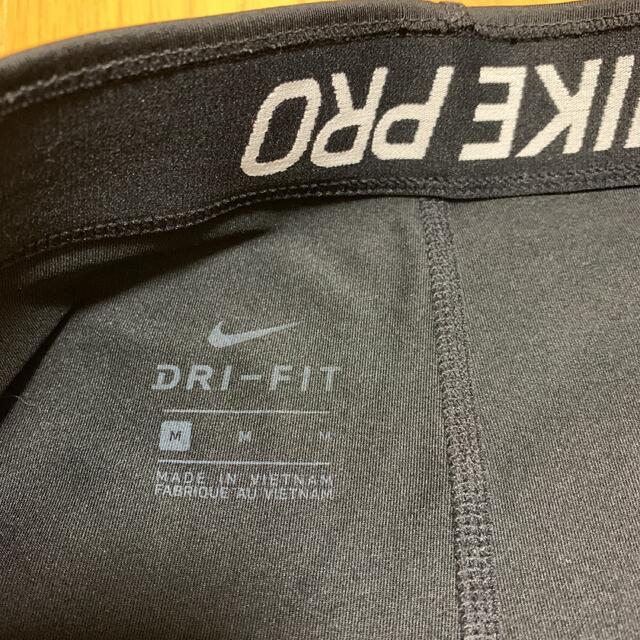 NIKE(ナイキ)のNIKE ナイキ  DRY FIT レディース　サイズM スポーツ/アウトドアのトレーニング/エクササイズ(トレーニング用品)の商品写真