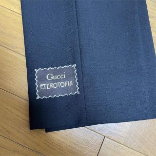 グッチ(Gucci)の期間限定●GUCCIグッチ裾ラベル付きグレーパンツ46新品(スラックス)