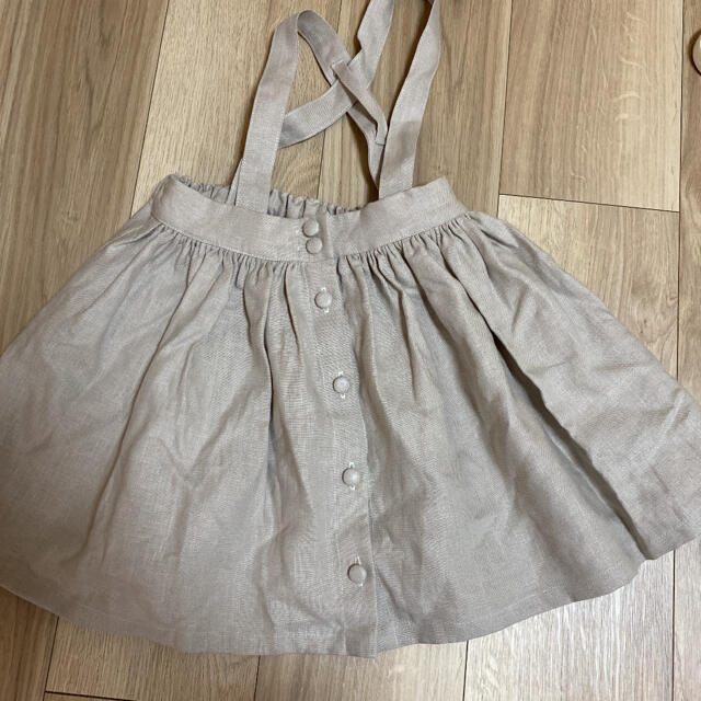 ハンドメイド作家さん　くるみボタン2wayスカート  キッズ/ベビー/マタニティのキッズ服女の子用(90cm~)(スカート)の商品写真