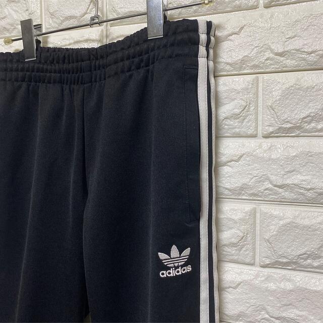 adidas(アディダス)の【adidas】トレフォイル 刺繍ロゴ トラックパンツ  ジョガーパンツ　黒 メンズのパンツ(その他)の商品写真