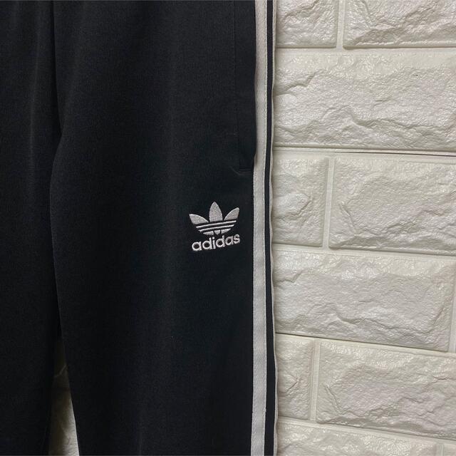 adidas(アディダス)の【adidas】トレフォイル 刺繍ロゴ トラックパンツ  ジョガーパンツ　黒 メンズのパンツ(その他)の商品写真