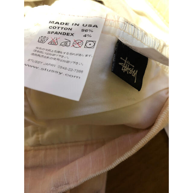 STUSSY(ステューシー)のステューシー　サーモンピンクストライプ・ストレッチパンツ　28インチ新品 レディースのパンツ(デニム/ジーンズ)の商品写真