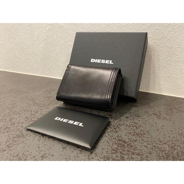 DIESEL(ディーゼル)の☆期間限定☆【新品、未使用、箱付き】ディーゼル コンパクト 折り財布 ブラック レディースのファッション小物(財布)の商品写真