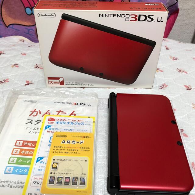 任天堂(ニンテンドウ)のニンテンドー3DS LL  レッドXブラック美品＋モンハンセット エンタメ/ホビーのゲームソフト/ゲーム機本体(携帯用ゲーム機本体)の商品写真