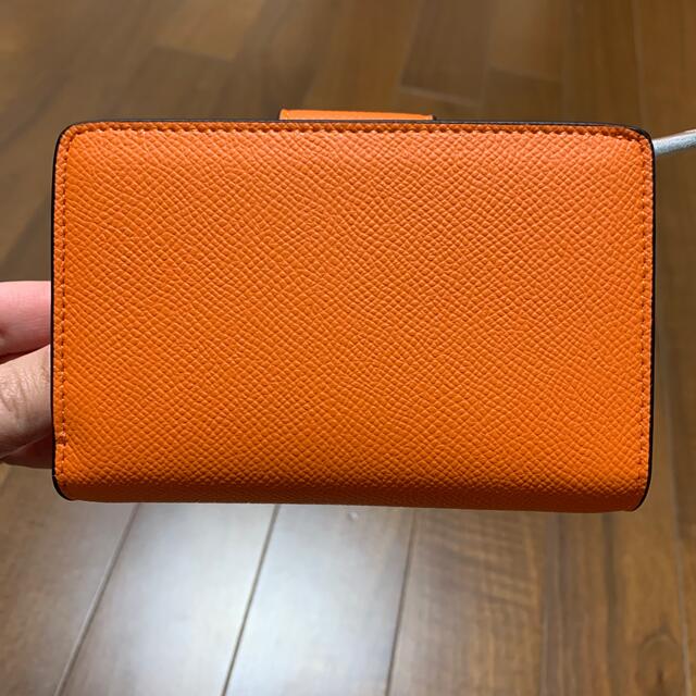 COACH(コーチ)のショップバック・箱付き　二つ折り財布　オレンジ×ワインレッド レディースのファッション小物(財布)の商品写真