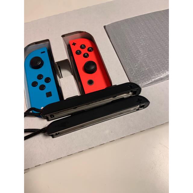 任天堂(ニンテンドウ)のNintendo Switch Joy-Con (L) ネオンブルー/ (R)  エンタメ/ホビーのゲームソフト/ゲーム機本体(家庭用ゲーム機本体)の商品写真