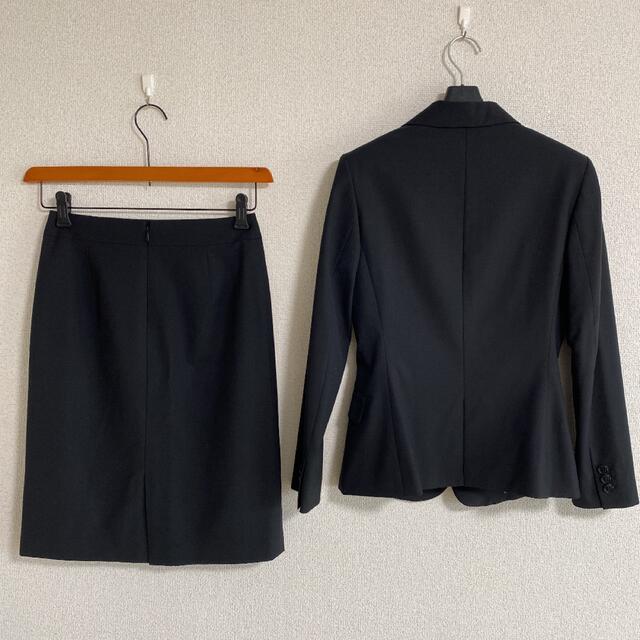 THE SUIT COMPANY(スーツカンパニー)のスーツカンパニー 上36下38 Ｗ64 スカートスーツ 黒 就活 洗濯可 DMW レディースのフォーマル/ドレス(スーツ)の商品写真