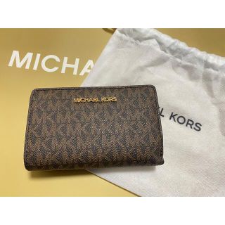 マイケルコース(Michael Kors)の【新品未使用】MICHAEL KORS シグネチャー　二つ折り財布(財布)