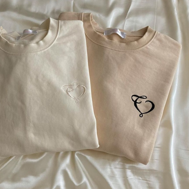 the virgins heart logo over sweat beige