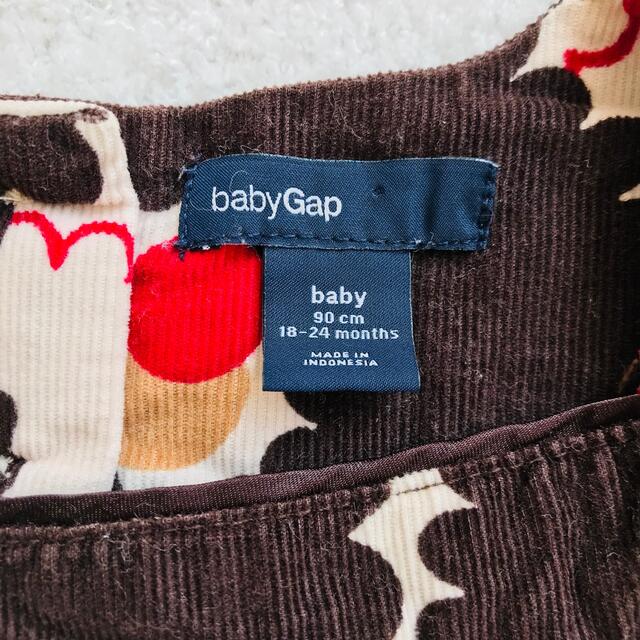 babyGAP(ベビーギャップ)の【匿名配送】baby Gap 90サイズ　茶色の花柄　スモック キッズ/ベビー/マタニティのキッズ服女の子用(90cm~)(その他)の商品写真