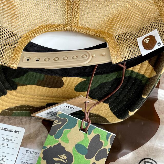 A BATHING APE(アベイシングエイプ)の【新品】BAPE x Stussy TRUCKER CAP イエロー メンズの帽子(キャップ)の商品写真