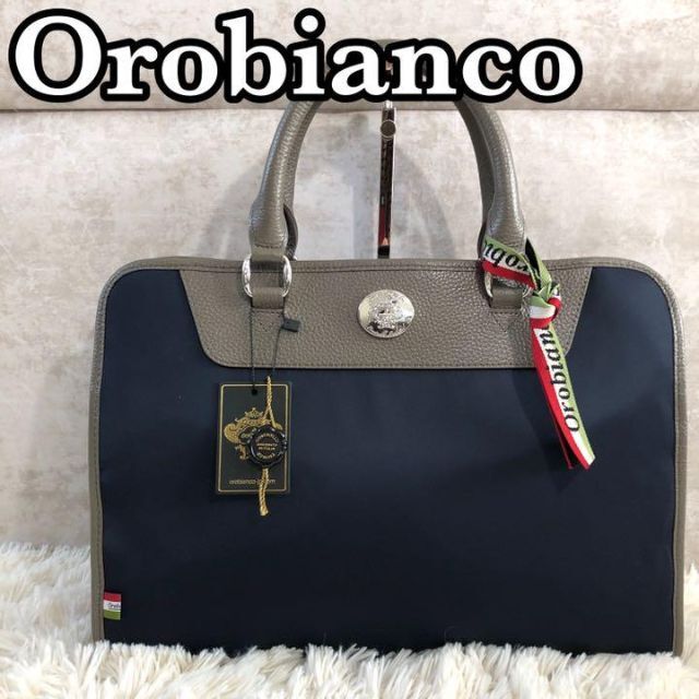Orobianco(オロビアンコ)の【未使用タグ付】オロビアンコ　ビジネスバッグ　ロゴ金具　レザー×ナイロン　灰×紺 メンズのバッグ(ビジネスバッグ)の商品写真
