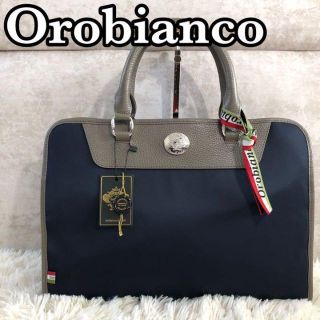 オロビアンコ(Orobianco)の【未使用タグ付】オロビアンコ　ビジネスバッグ　ロゴ金具　レザー×ナイロン　灰×紺(ビジネスバッグ)