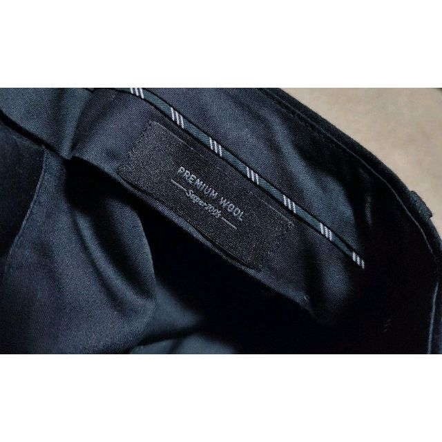 UNIQLO(ユニクロ)のプレミアムウール Super100 ストレッチ ウールパンツ 綾織り ブラック メンズのパンツ(スラックス)の商品写真