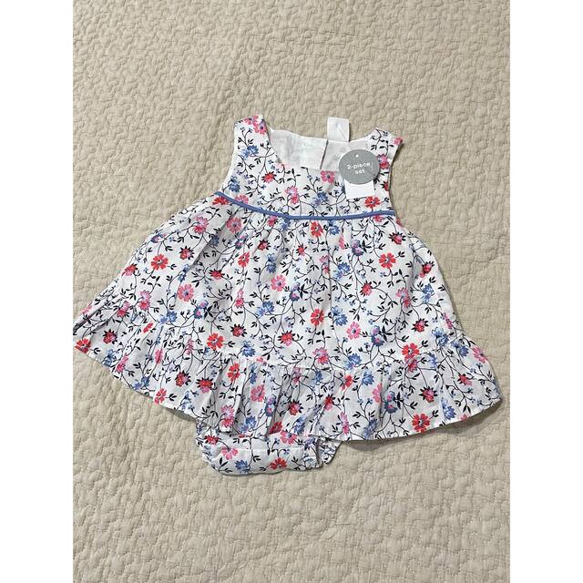 babyGAP(ベビーギャップ)の【新品】GAP花柄フリルセットアップ キッズ/ベビー/マタニティのベビー服(~85cm)(ロンパース)の商品写真