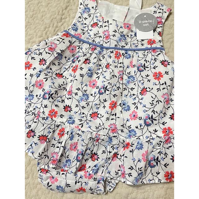 babyGAP(ベビーギャップ)の【新品】GAP花柄フリルセットアップ キッズ/ベビー/マタニティのベビー服(~85cm)(ロンパース)の商品写真