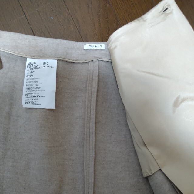 miumiu(ミュウミュウ)の値下げ　ミュウミュウ　巻スカート レディースのスカート(ミニスカート)の商品写真