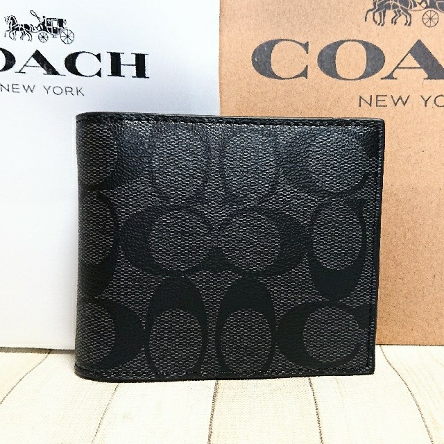 COACH(コーチ)の正規品　新品未使用　コーチ　財布　ブラック　ダンボ　ディズニー　Disney レディースのファッション小物(財布)の商品写真