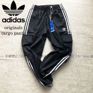 アディダス(adidas)の新品　アディダス カーゴパンツMサイズ　 ナイロン トラックパンツ 黒 ブラック(ワークパンツ/カーゴパンツ)