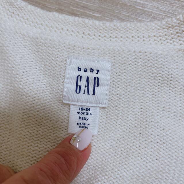 babyGAP(ベビーギャップ)のベビーギャップ　ポンポンぽこぽこカーディガン ボレロ　 キッズ/ベビー/マタニティのキッズ服女の子用(90cm~)(カーディガン)の商品写真