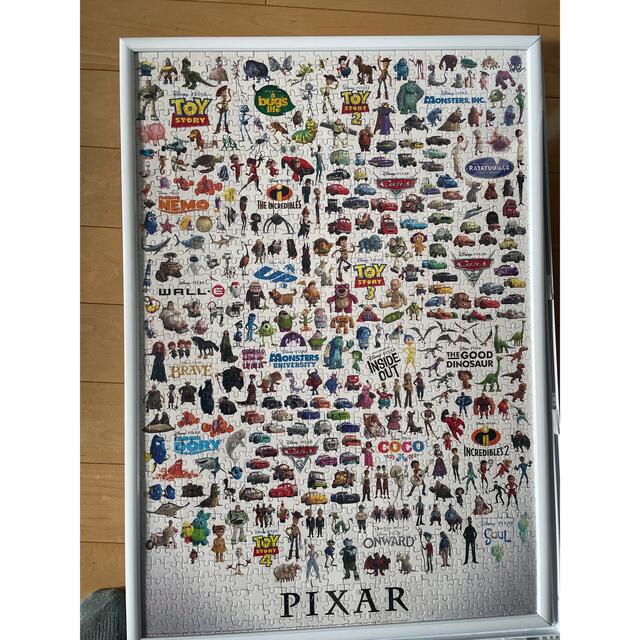 pixar 1000ピースパズル　額縁 エンタメ/ホビーのおもちゃ/ぬいぐるみ(キャラクターグッズ)の商品写真