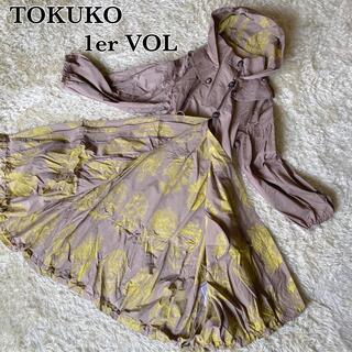 トクコプルミエヴォル(TOKUKO 1er VOL)のトクコプルミエヴォル　スプリングコート　総柄　バルーン裾　ベージュ(スプリングコート)