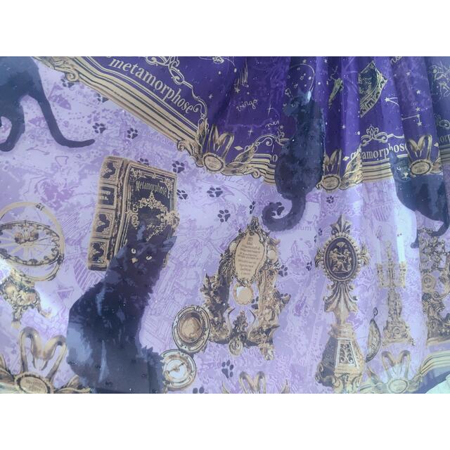 metamorphose temps de fille(メタモルフォーゼタンドゥフィーユ)のメタモルフォーゼ  黒猫と魔法の地図　リボンジャンパースカート(紫系) レディースのワンピース(ひざ丈ワンピース)の商品写真