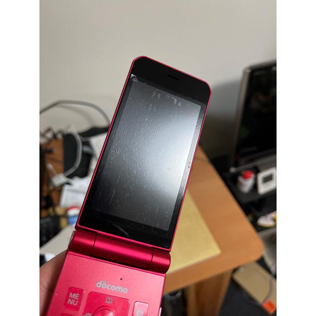 F-03Lレッド スマホ/家電/カメラのスマートフォン/携帯電話(携帯電話本体)の商品写真