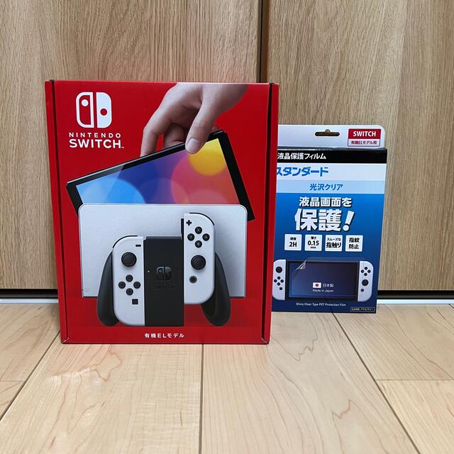 Nintendo Switch(ニンテンドースイッチ)の新品未使用 Switch 任天堂 スイッチ 本体 有機EL ホワイト フィルム エンタメ/ホビーのゲームソフト/ゲーム機本体(家庭用ゲーム機本体)の商品写真